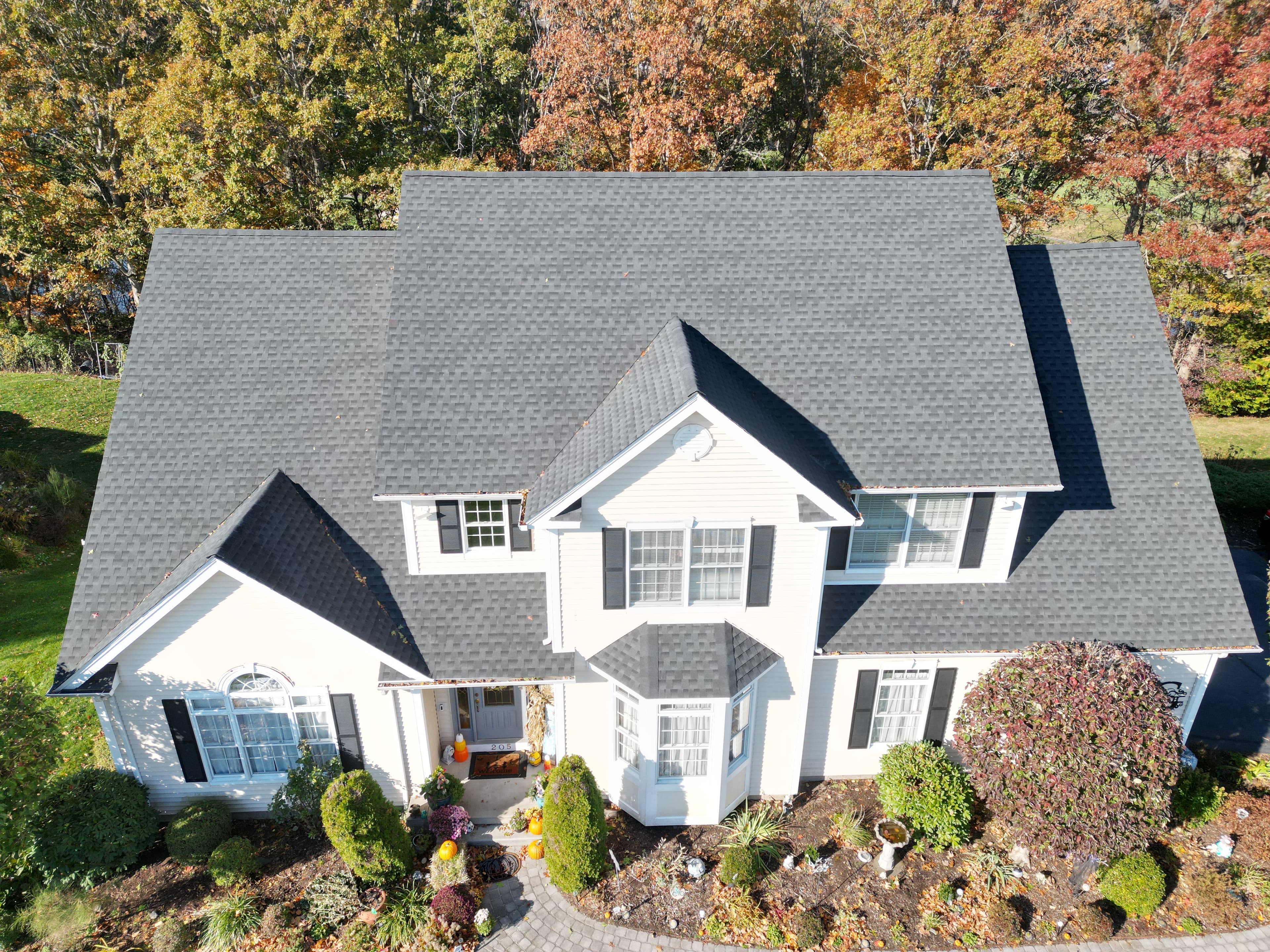 Professional roof replacement Great River neighborhood Milford Connecticut aerial drone photo