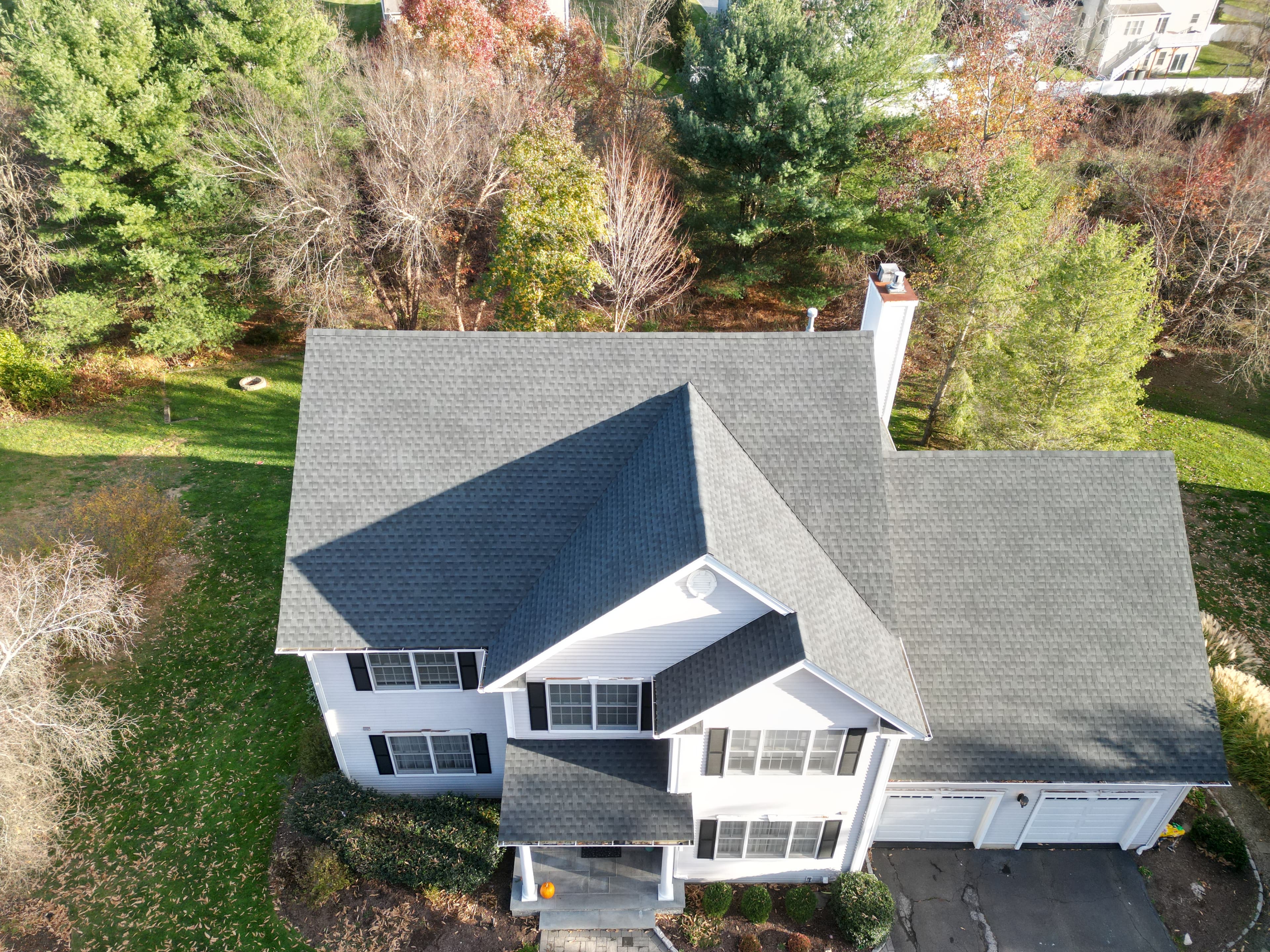 Milford CT roof replacement aerial view showing completed installation by PRC Builders