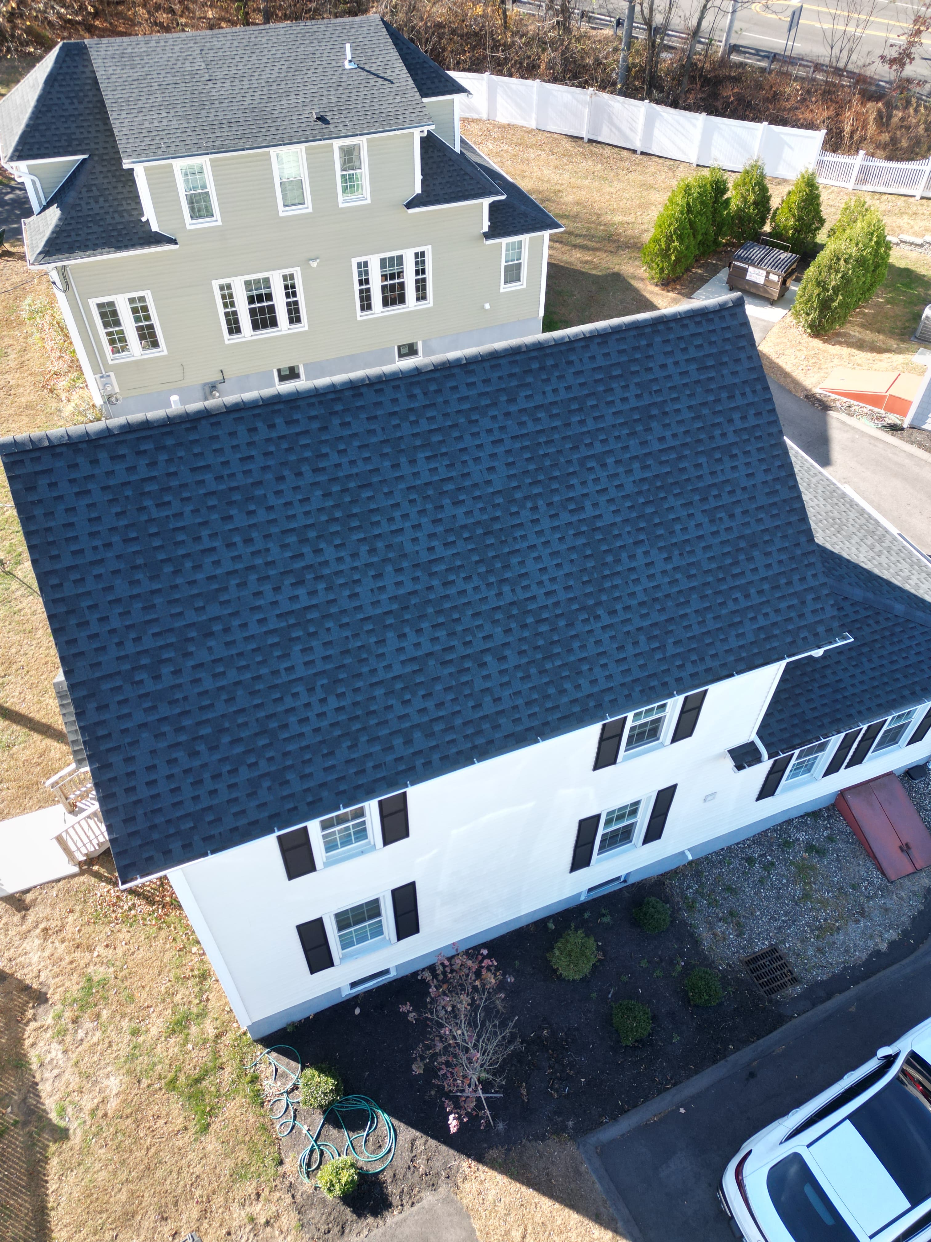 Completed roof replacement Milford Connecticut aerial view showing professional results
