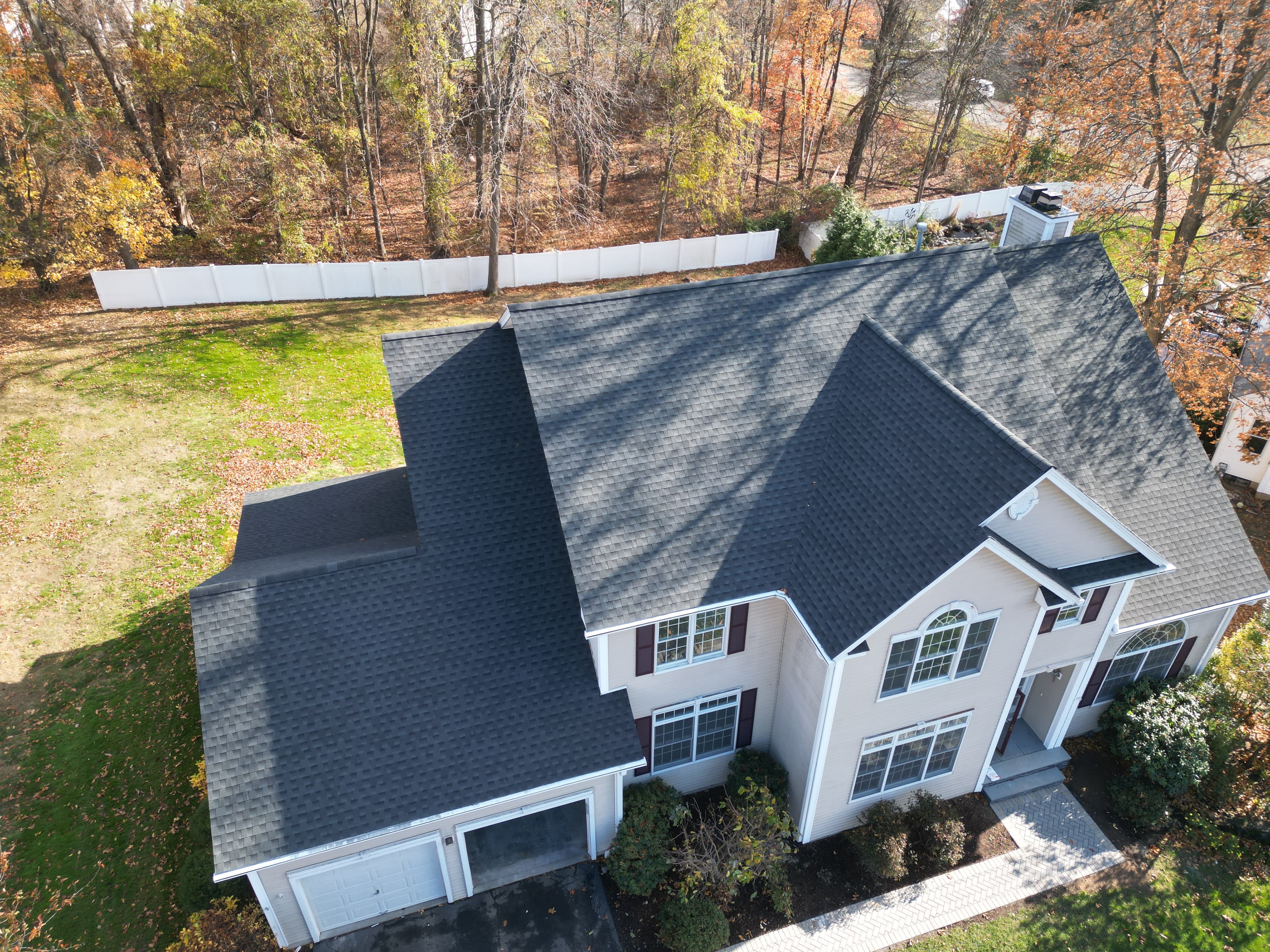 Professional roof installation Milford Connecticut aerial drone photography showing quality workmanship